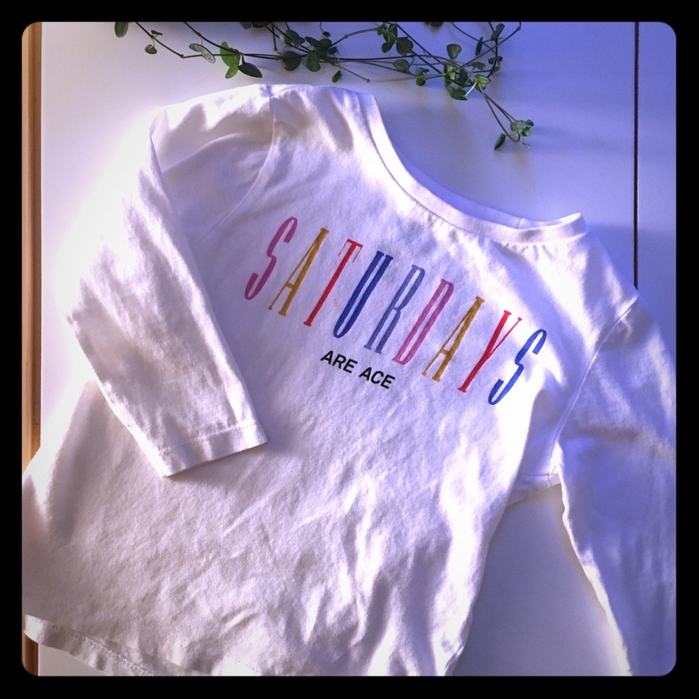 Fun white long sleeved T shirt.